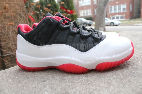 Air Jordan Xi Low White Black Varsity Red 04