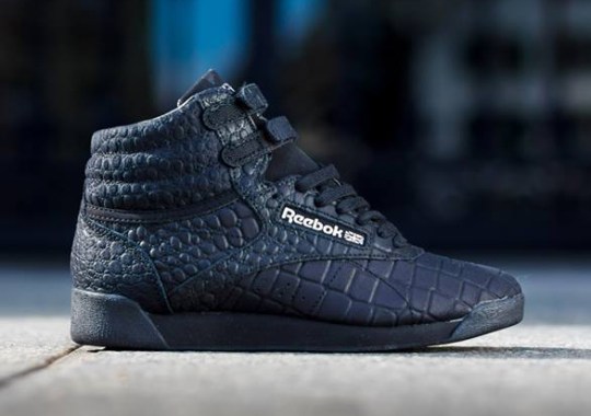 Reebok Freestyle Hi “Exotics” – Black – Metallic Silver