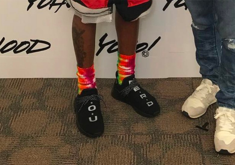 Pharrell Wears a N.E.R.D. Edition Of His adidas NMD Hu