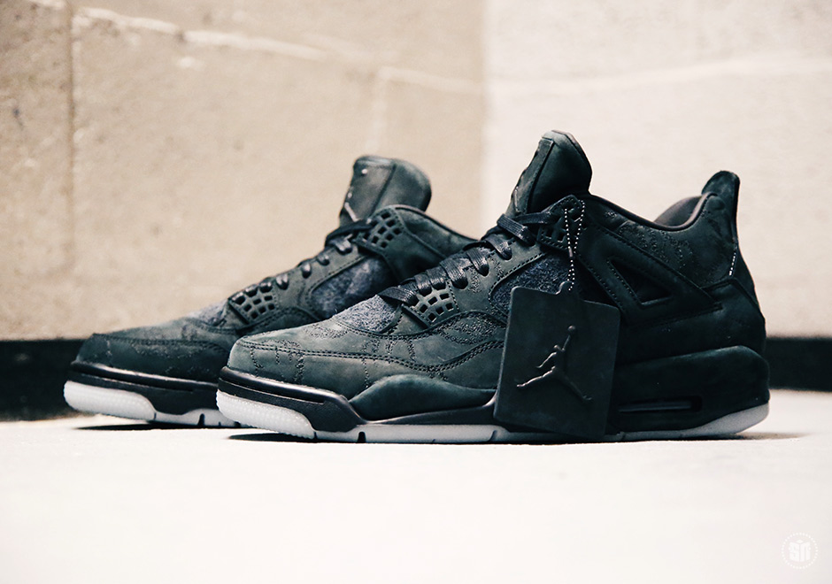 The KAWS x Air Jordan 4 In Black Is Releasing On Black Friday