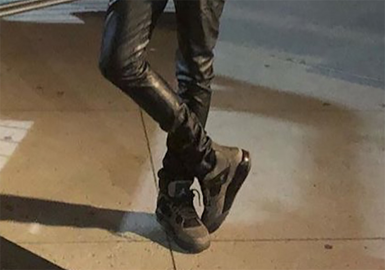 Travis Scott Spotted In Dark Grey Air Jordan 4