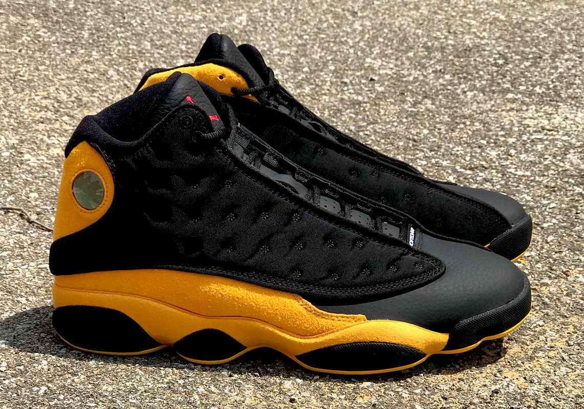 Jordan 13 Melo Graduation Black Yellow Red 1