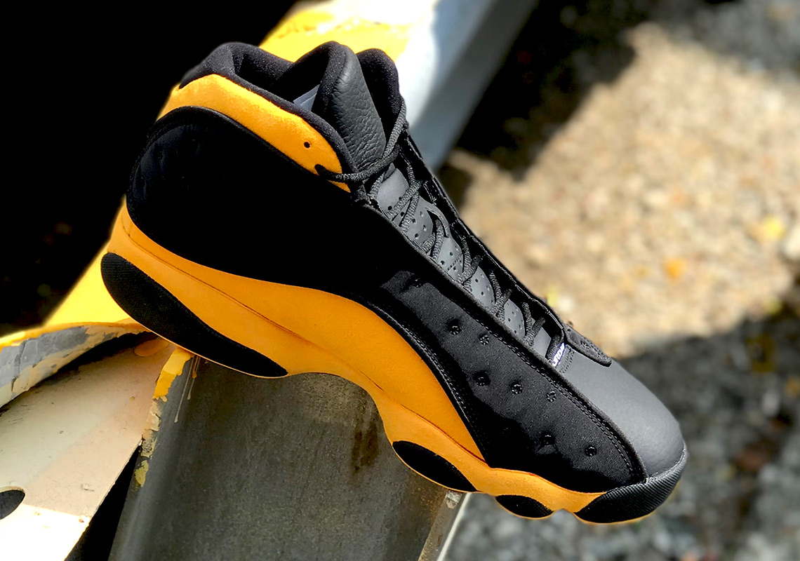 Jordan 13 Melo Graduation Black Yellow Red 5