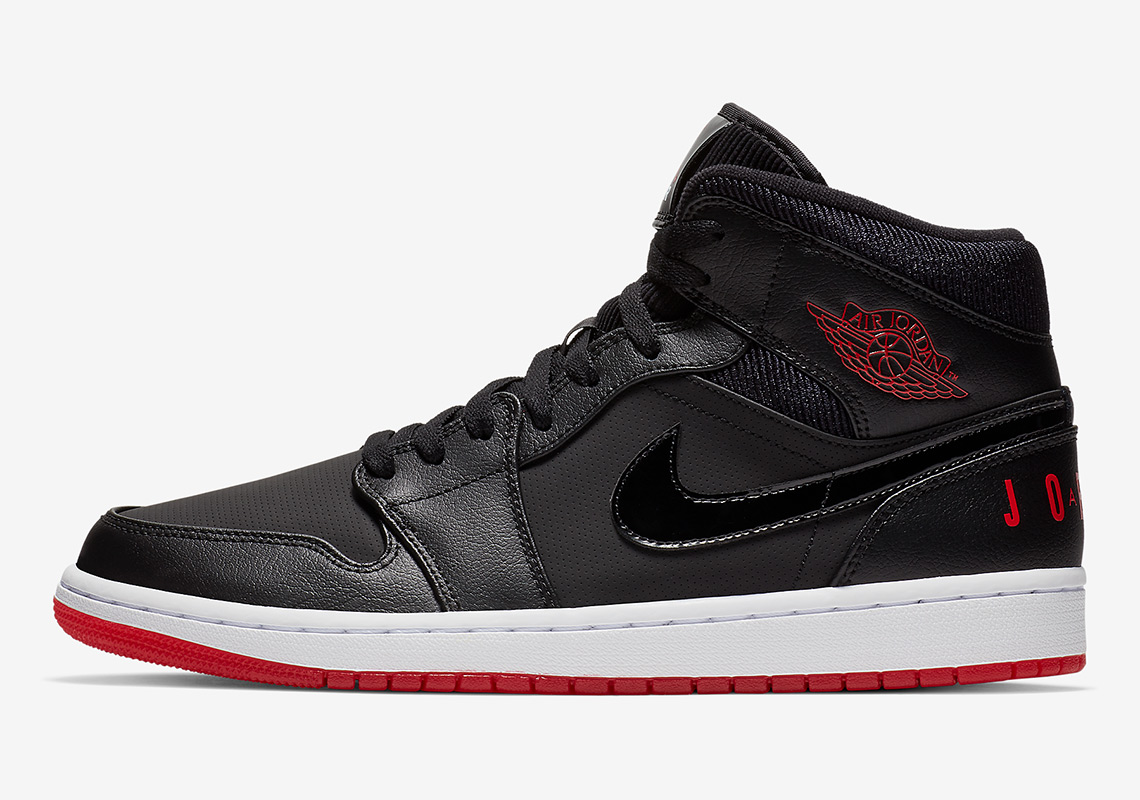 The Air Jordan 1 Mid "Bred" Features Classic Logo On The Heel