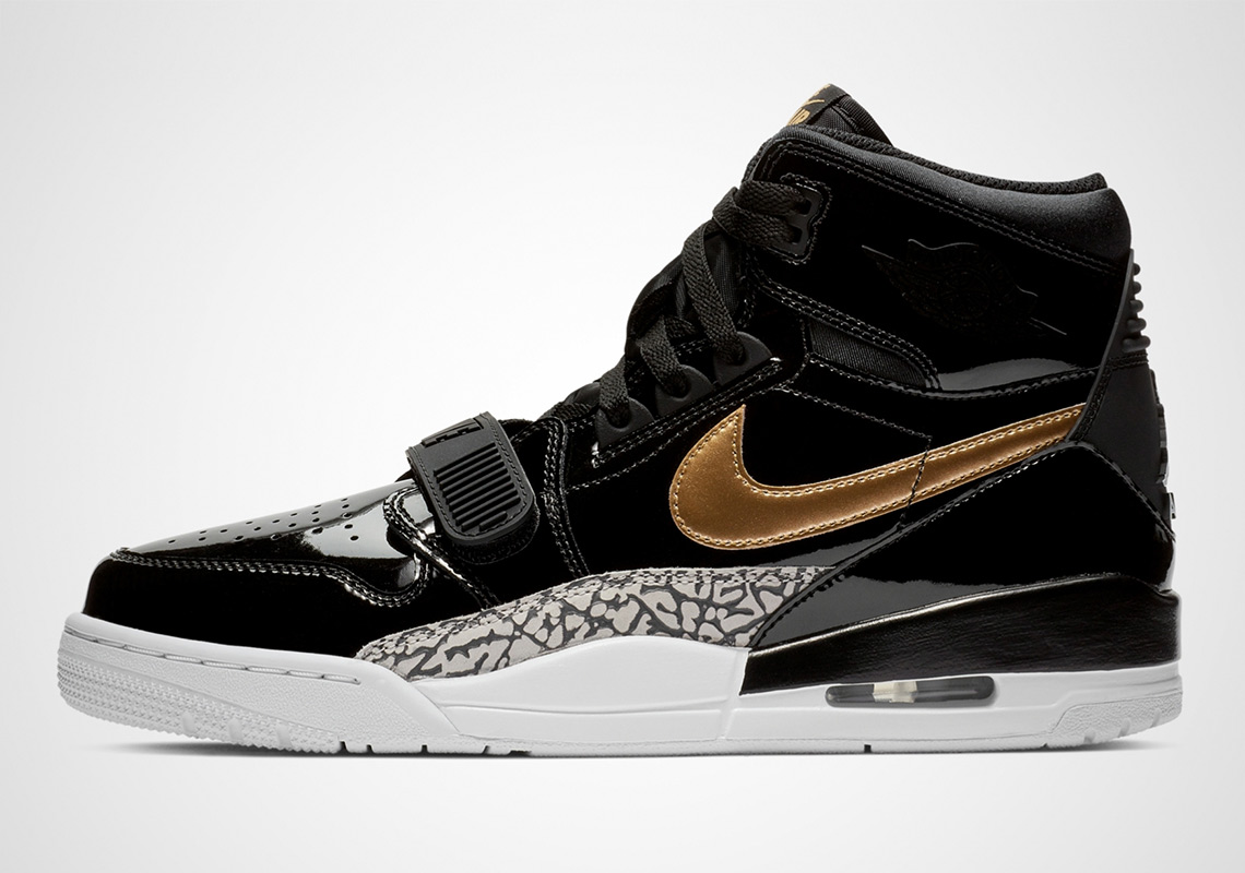 The Jordan Legacy 312 Appears In Black And Gold Patent Leather