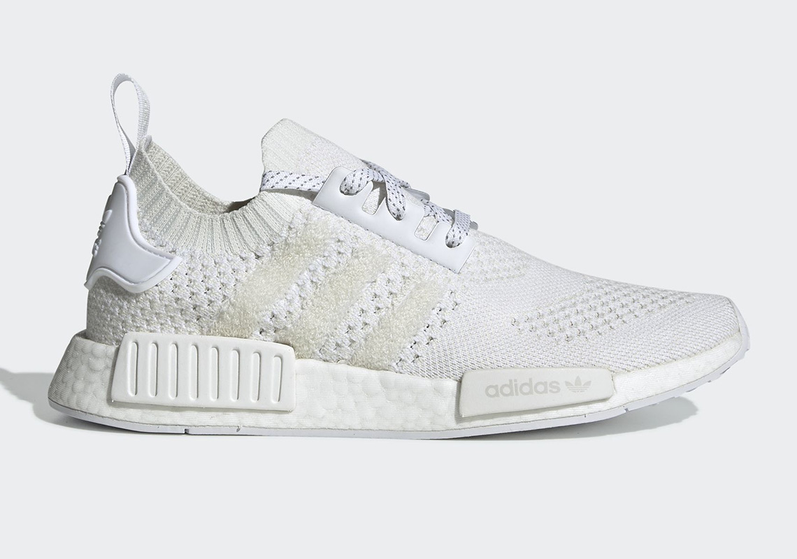 The adidas NMD R1 "Triple White" Returns With A Familiar Pattern