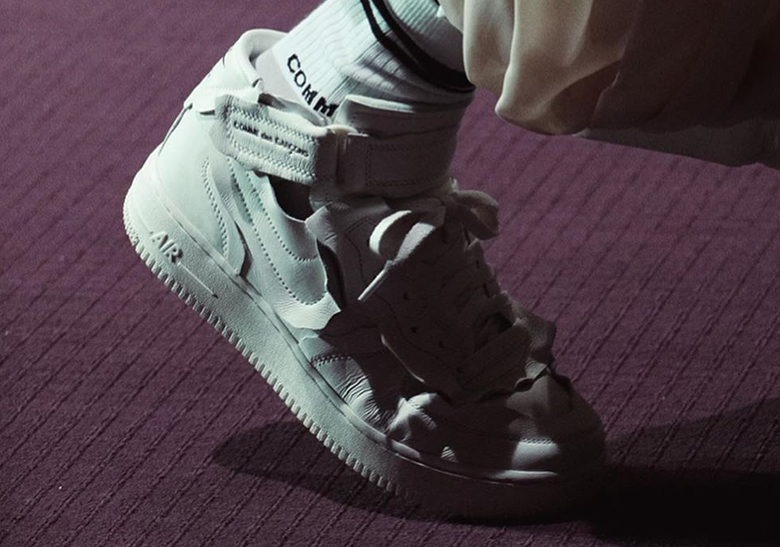 COMME des GARÇONS Reveals Nike Air Force 1 Mid Collaboration At Paris Fashion Week