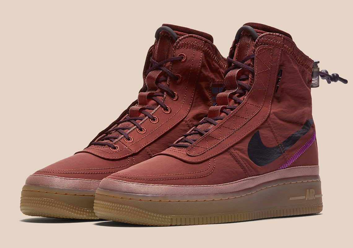 The Nike Air Force 1 Shell Is Fitted With Maroon Uppers