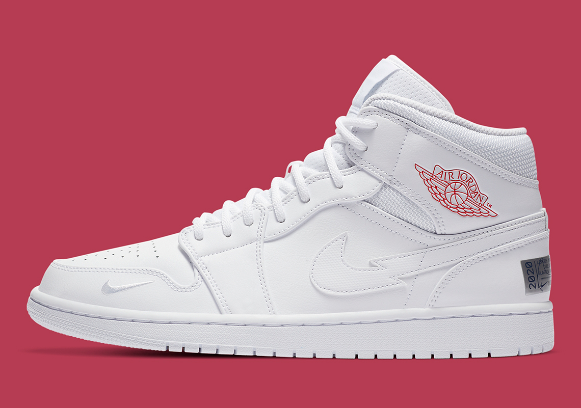 The Air Jordan 1 Mid “Nike Swoosh On Tour” Dials Up The Amps Through Its Logo