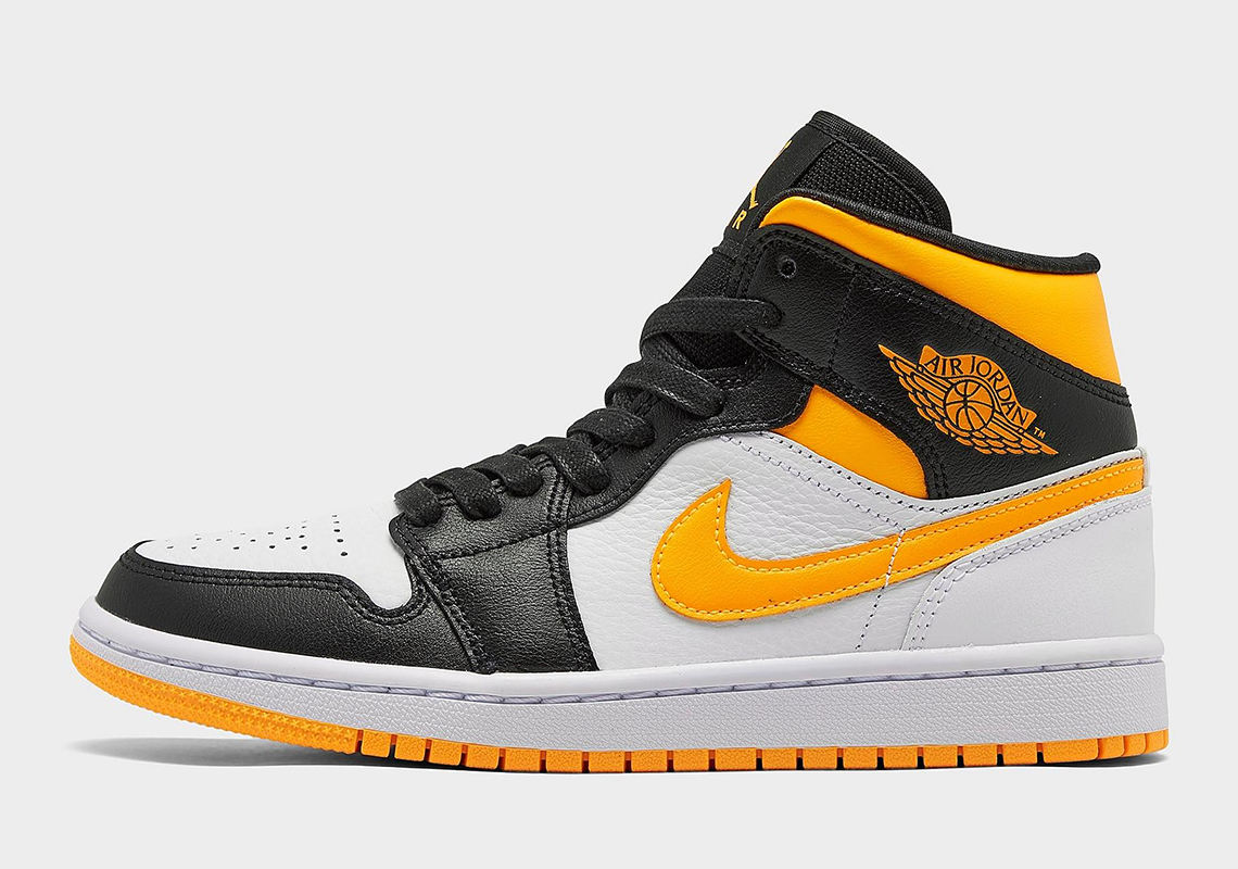 The Air Jordan 1 Mid Pairs The Classic Black Toe With Laser Orange