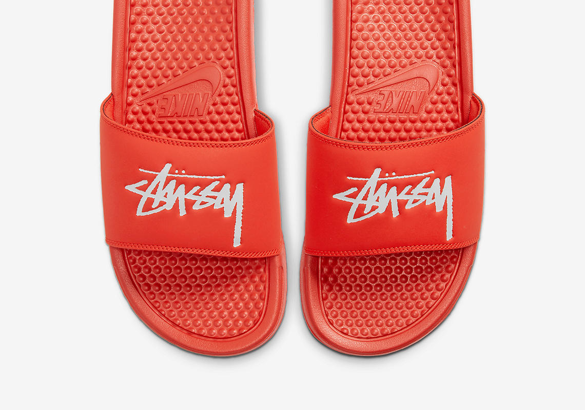 The Stussy x Nike Benassi Slides Drops On July 30th