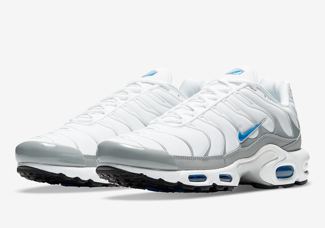 The Nike Air Max Plus Pairs Laser Blue Accents With A Clean White And Silver