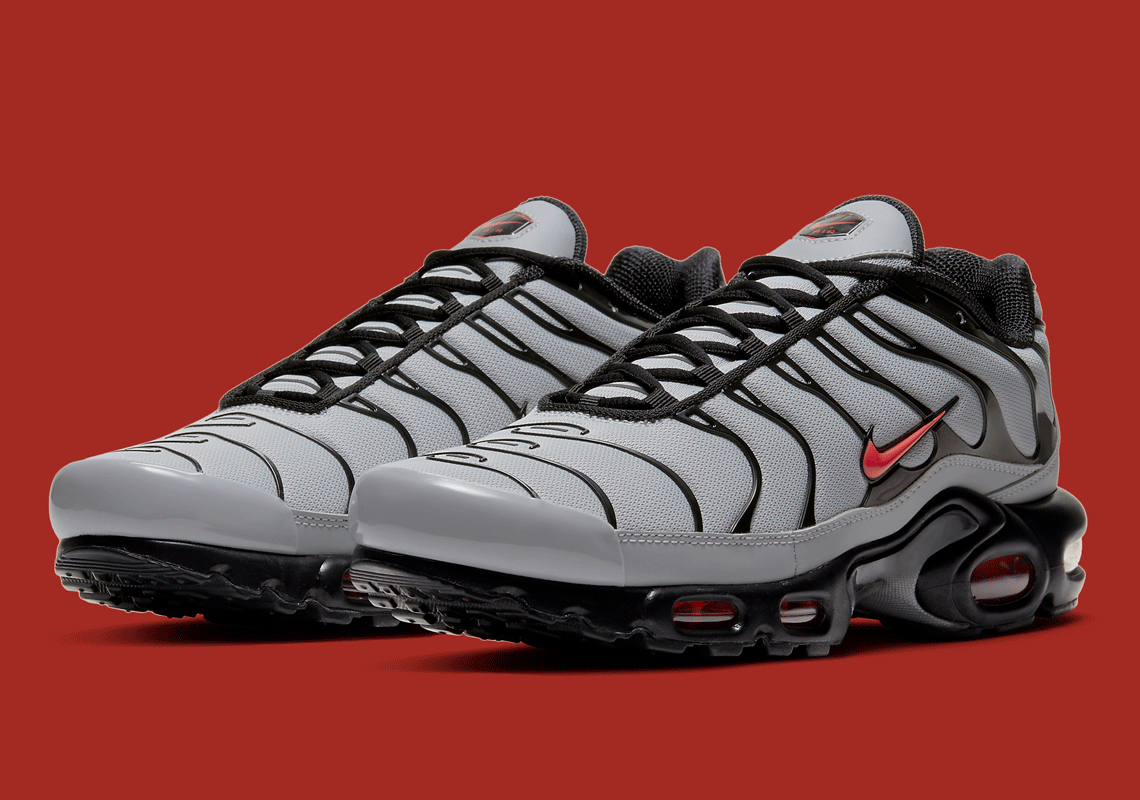 The Nike Air Max Plus Surfaces In Grey, Black, And Red