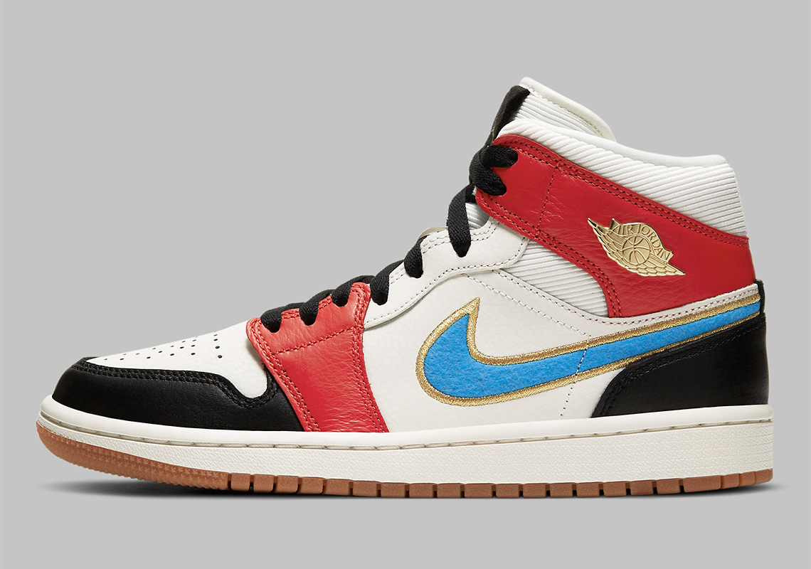 This Premium Air Jordan 1 Mid Packs In Golden Accents, Embroidered Swooshes, And More