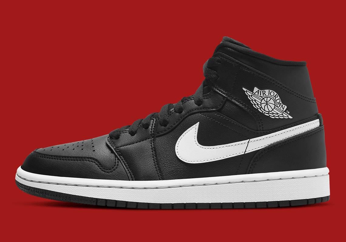 The Air Jordan 1 Mid Appears In Simple "Black/White" Reminiscent Of "Premium Essentials"