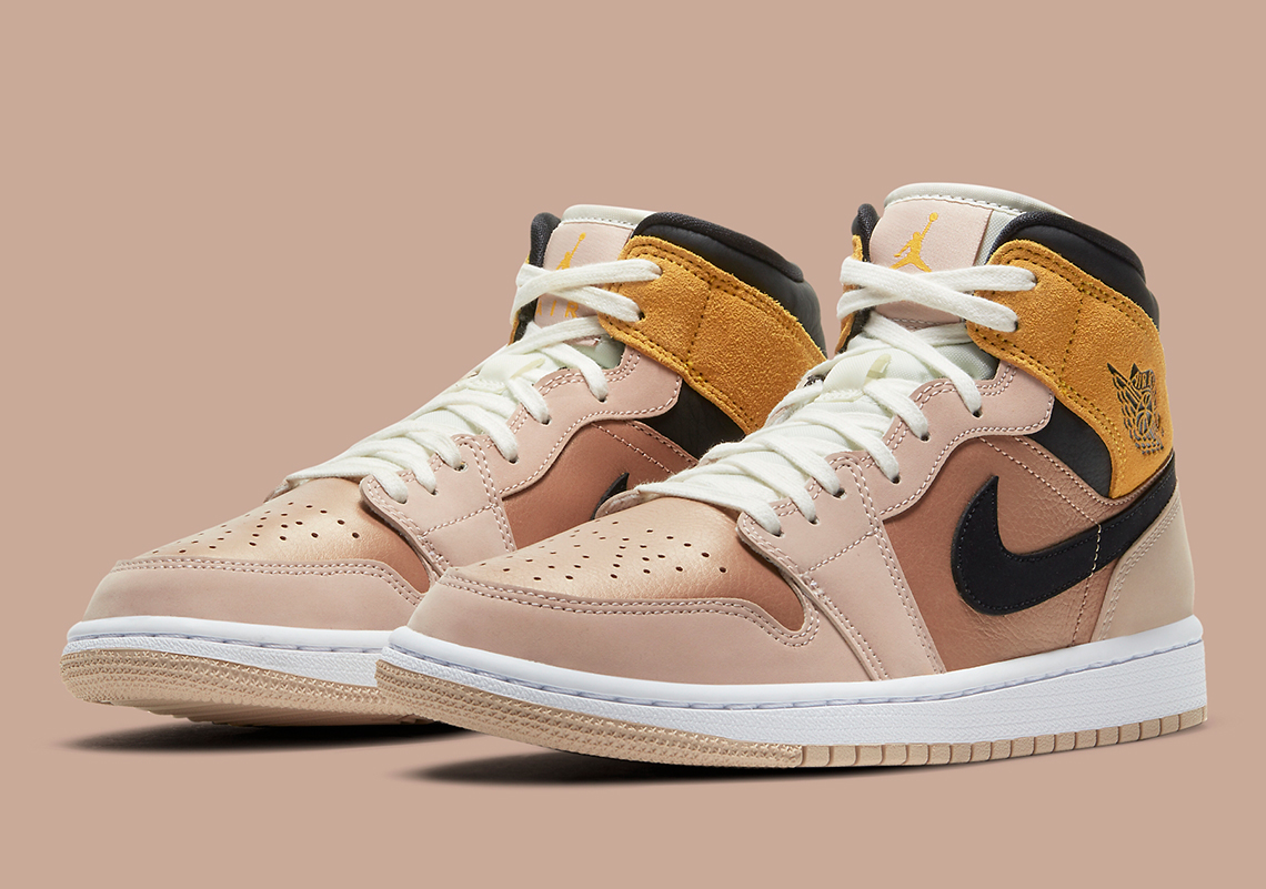 Particle Beige And Metallic Red Bronze Cover This Upcoming Air Jordan 1 Mid