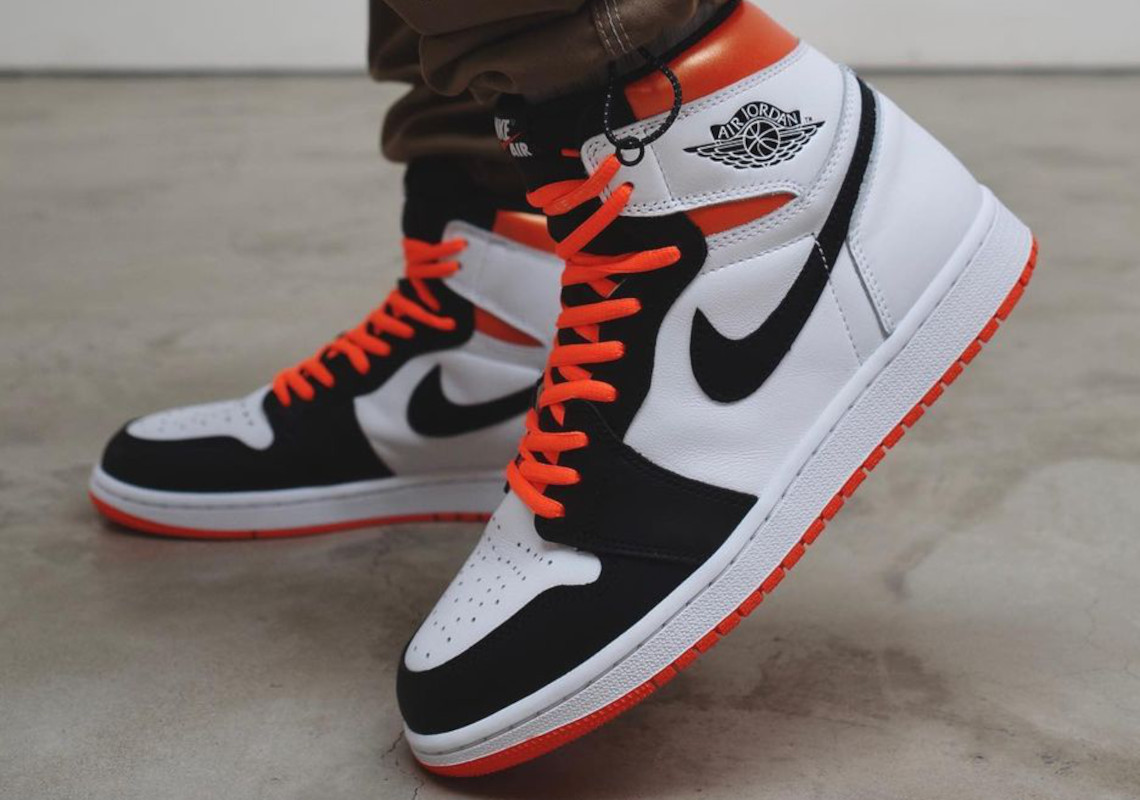 "Starfish" Orange Takes A Break As The Air Jordan 1 Welcomes "Electro Orange"