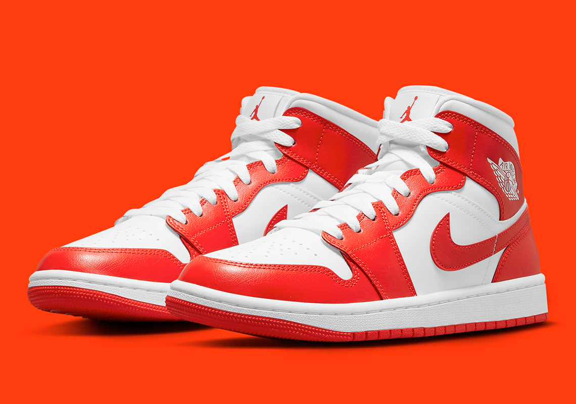 This Women's Air Jordan 1 Mid Features Blazing Hot Orange Uppers