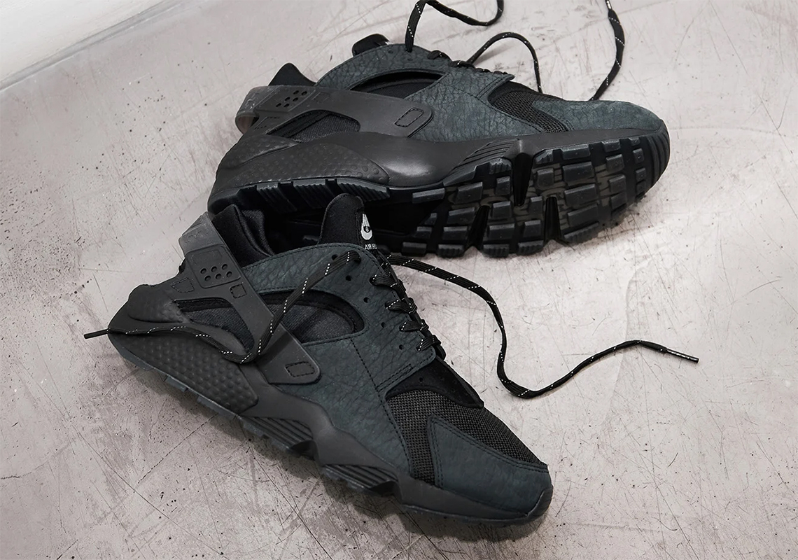 The Original Nike Air Huarache Slogan Featured On This Black Tumbled Leather Drop