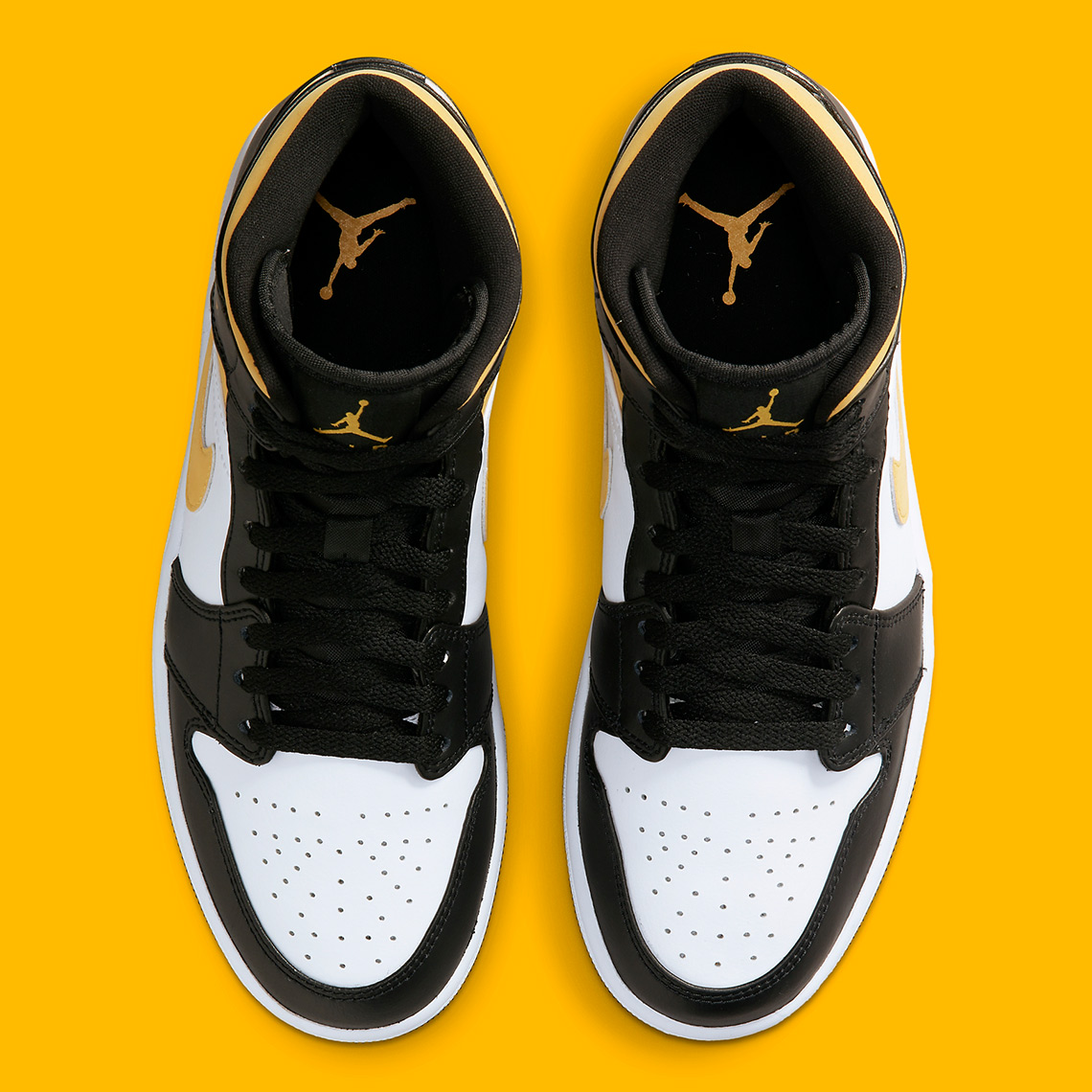 Air Jordan 1 Mid Black University Gold 554724 177 2