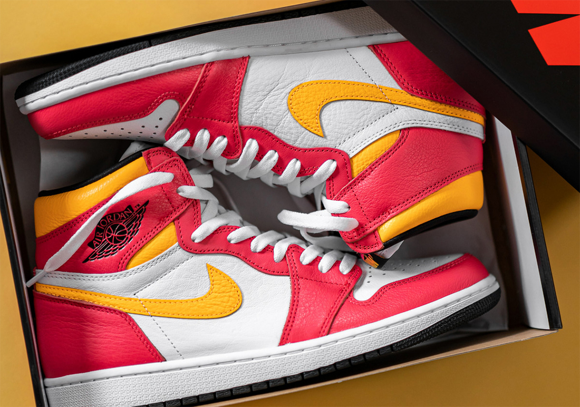 The Air Jordan 1 Retro High OG "Light Fusion Red" Releases Tomorrow