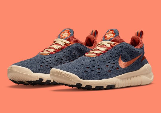 A New Nike Free Run Trail Pairs “Thunder Blue” With “Cinnabar”