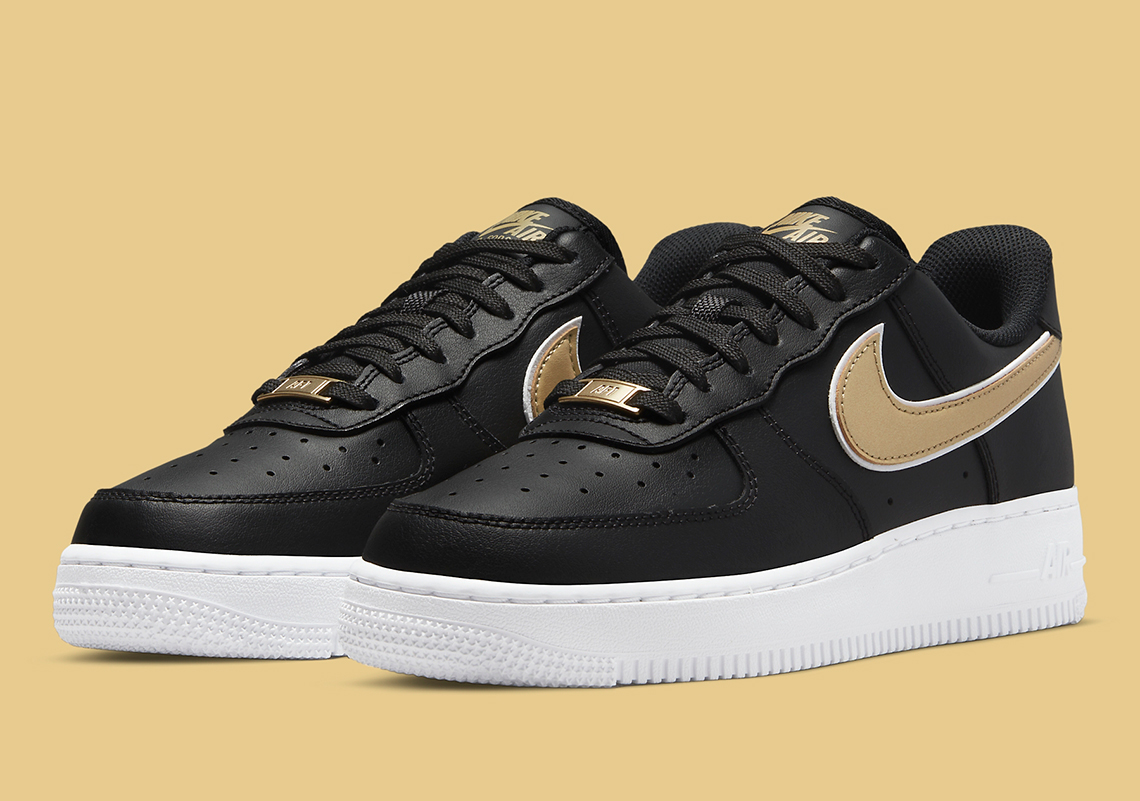 Metallic Gold Swooshes Gives This Nike Air Force 1 An OG Vandal Look