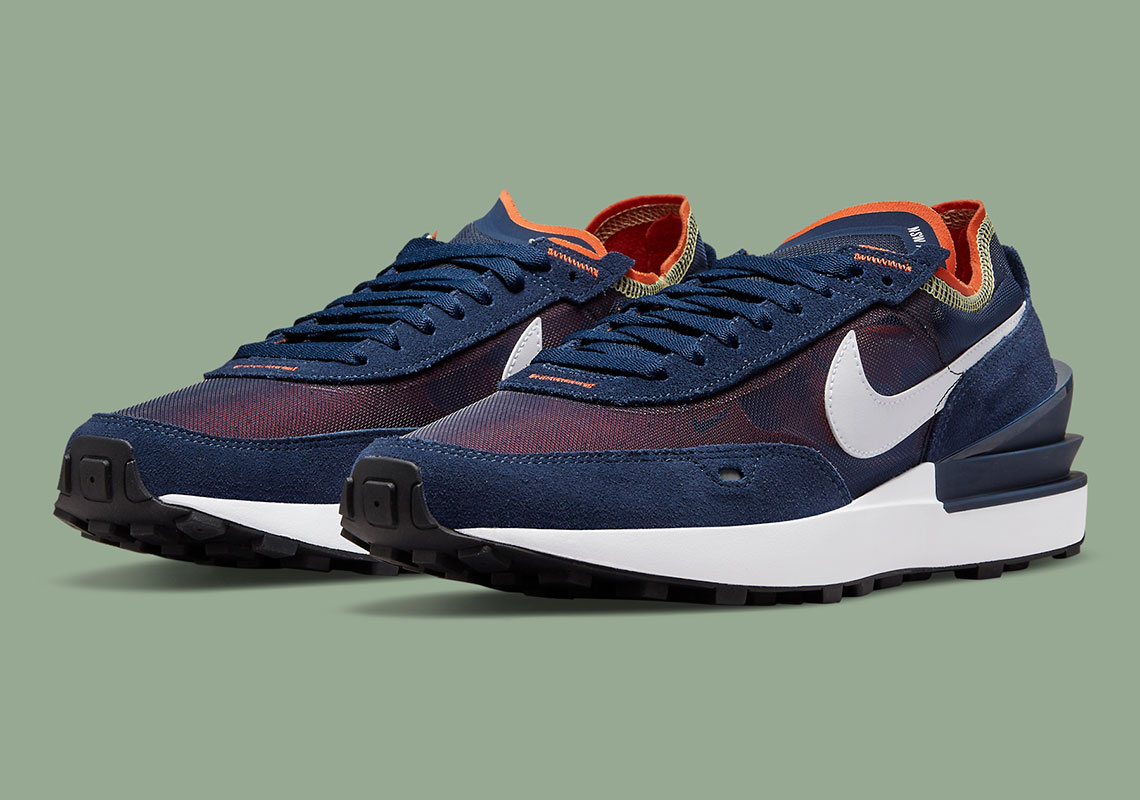 Hits Of Orange Brighten Up This Navy Nike Waffle One