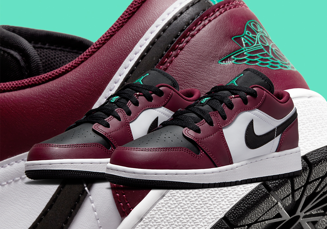 The Air Jordan 1 Low Pairs Dark Beetroot With Roma Green