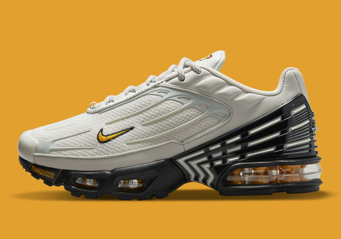 A Kid's Nike Air Max Plus 3 Appears In Grey, Black And Gold