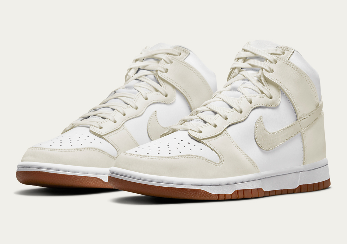 The Latest Women's Exclusive Nike Dunk High Adds Gum Bottoms To A White/Sail Upper