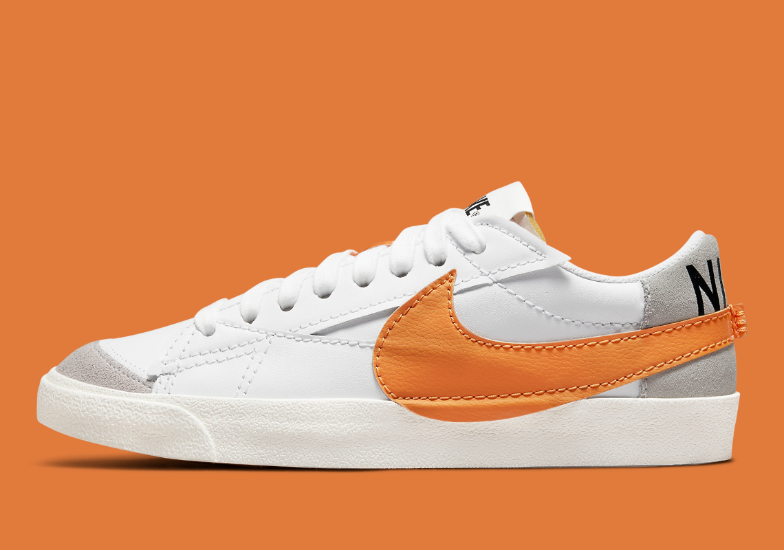 Vibrant Orange Swooshes Land On The Women's Nike Blazer Low Jumbo