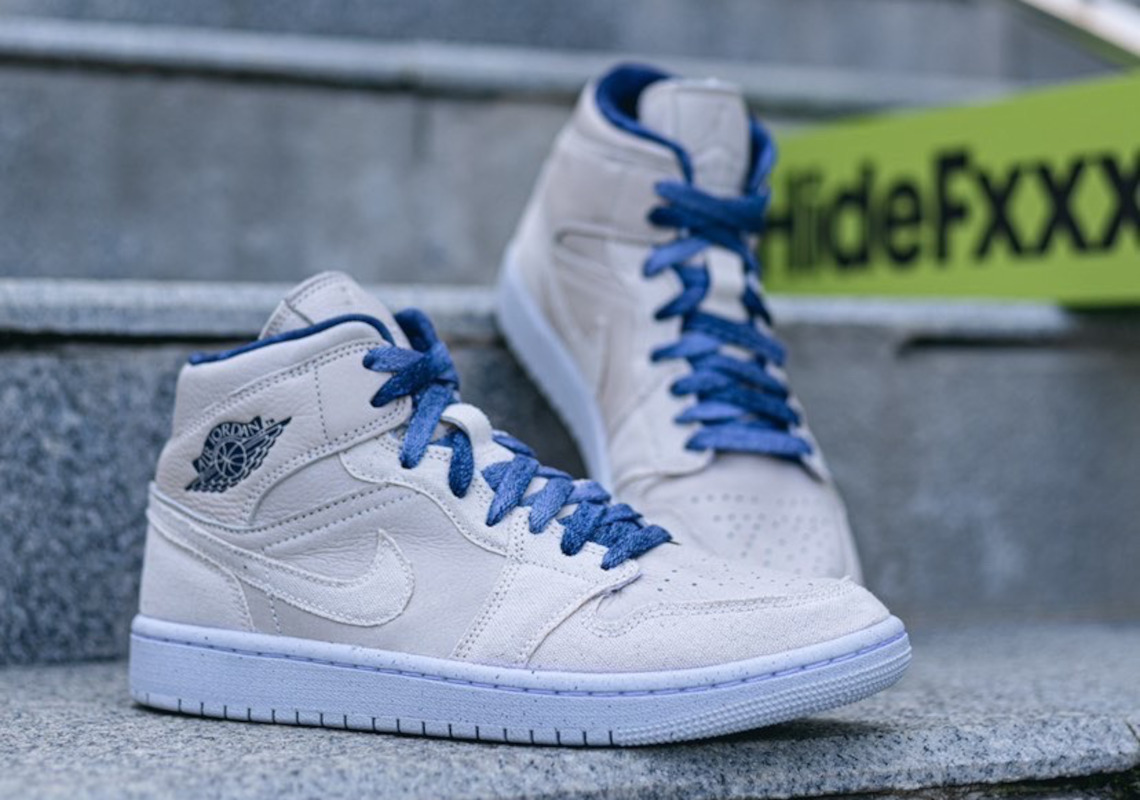 "Coconut Milk"-Colored Canvas Comes Together With Indigo Accents On This Air Jordan 1 Mid