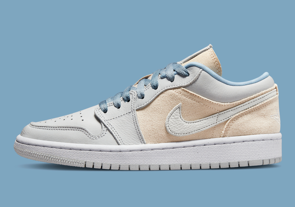 A Canvas-Covered Air Jordan 1 Low Appears In Light Grey And Tan Tones