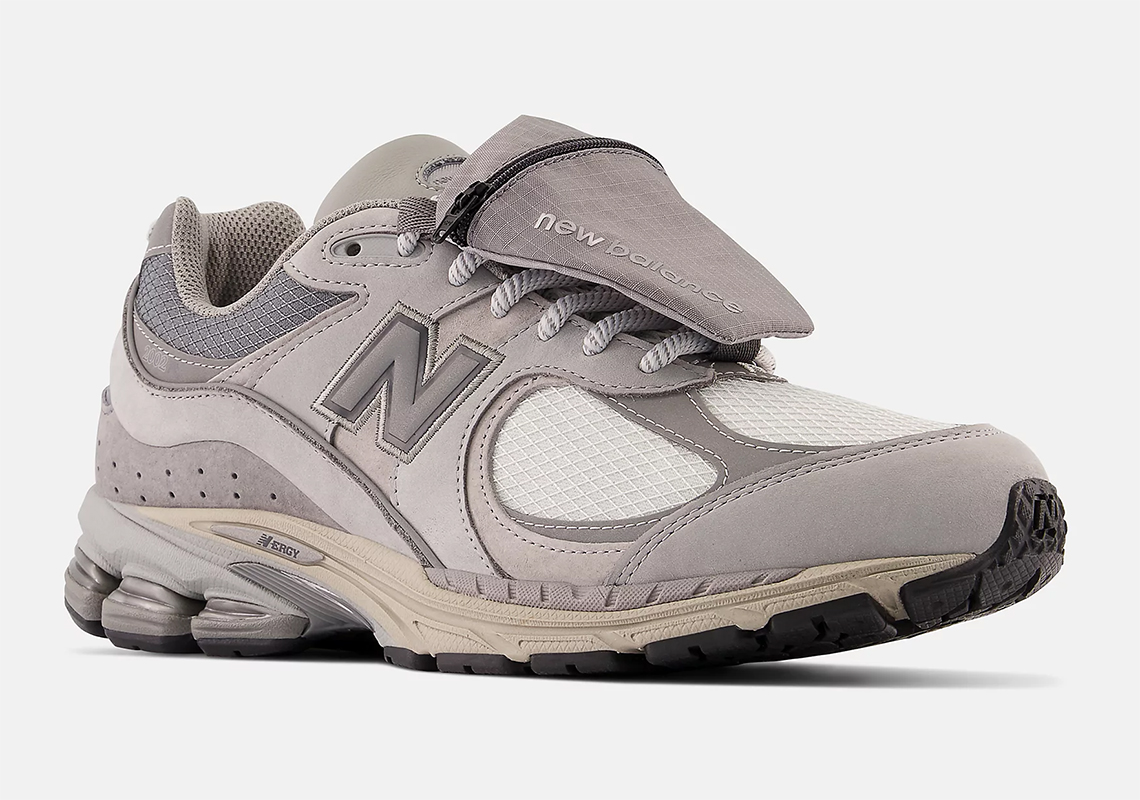 The New Balance 2002R With Stow Pockets Appears In Classic Grey