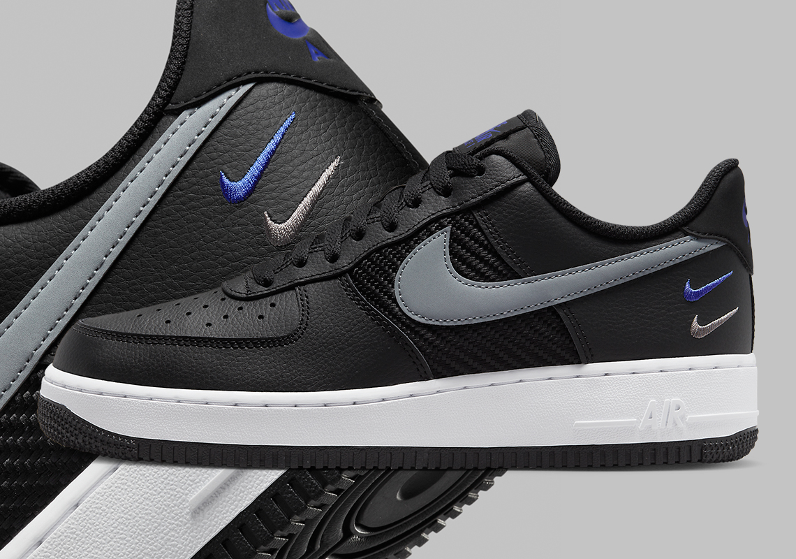 Triple Swooshes Play An Accenting Role To This Black-Dominant Air Force 1 Low