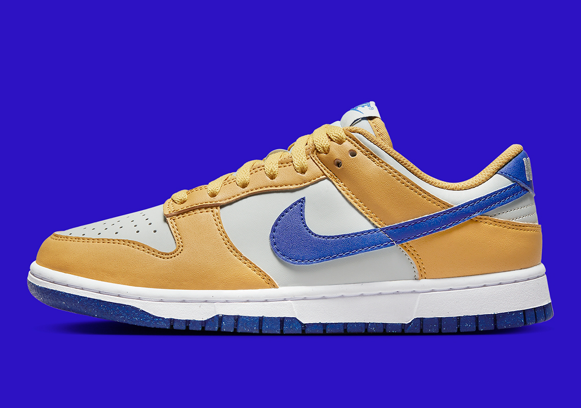 The Nike Dunk Low Next Nature Dazzles In University Gold And Royal