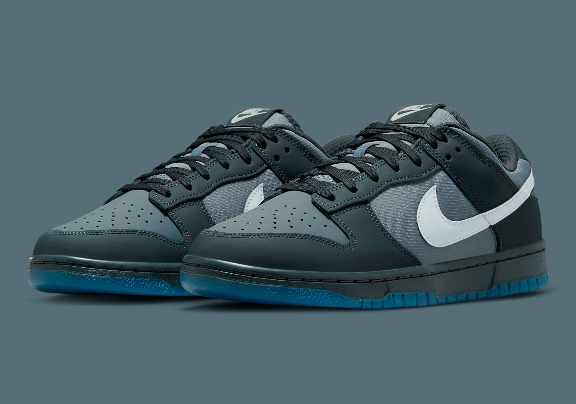 Shades Of "Anthracite" And Reflective Swooshes Land On The Nike Dunk Low