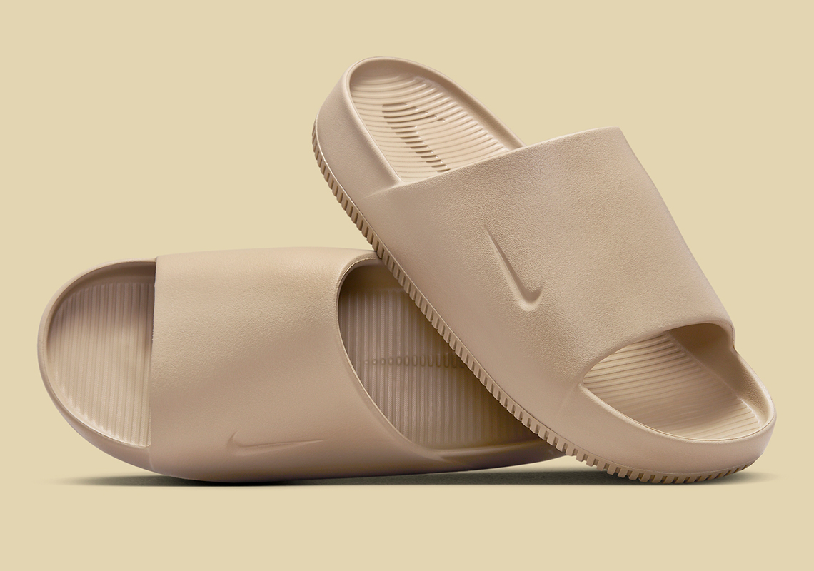 The Nike Calm Slide Assumes A Clad-"Khaki" Build