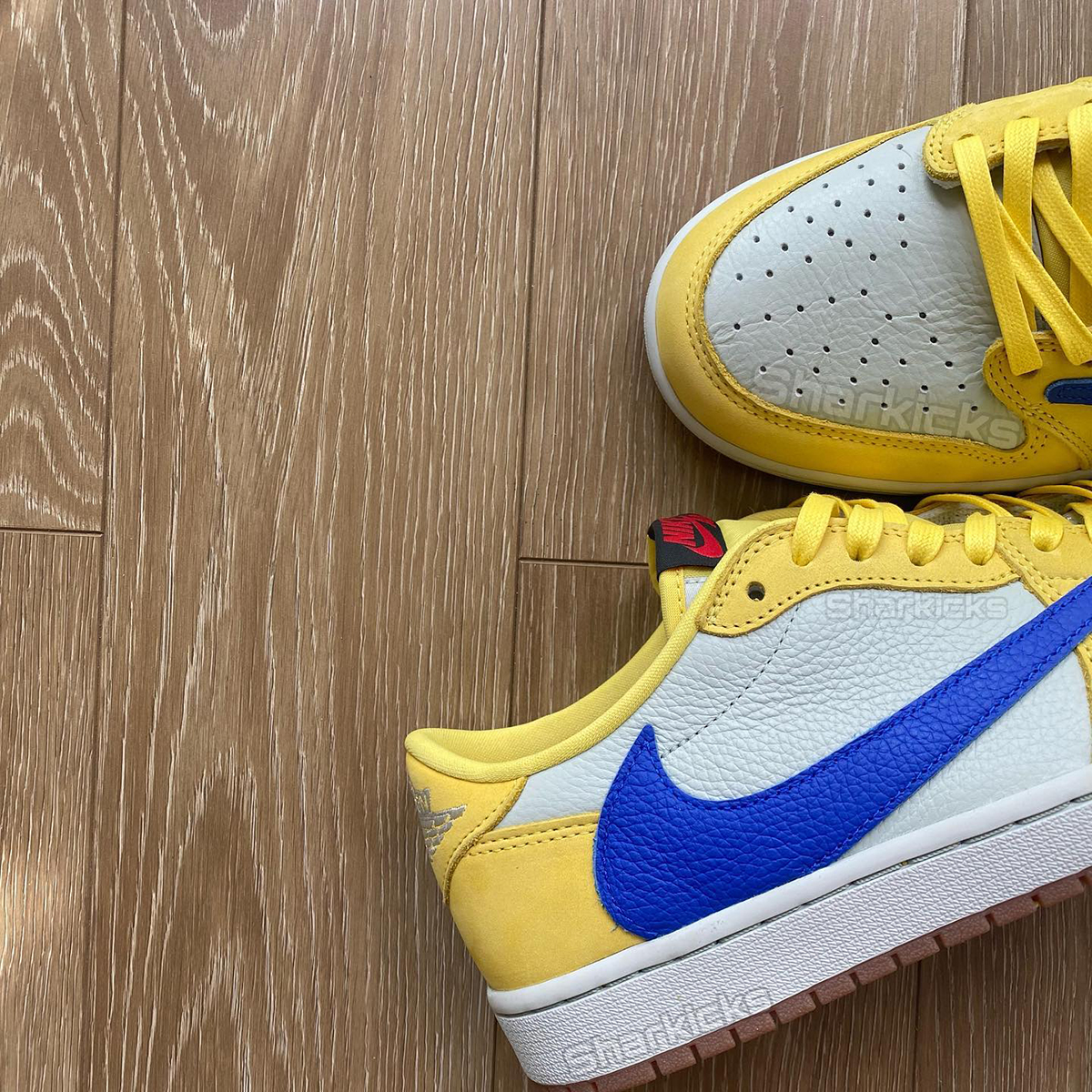 Travis Scott Jordan 1 Low Canary 1