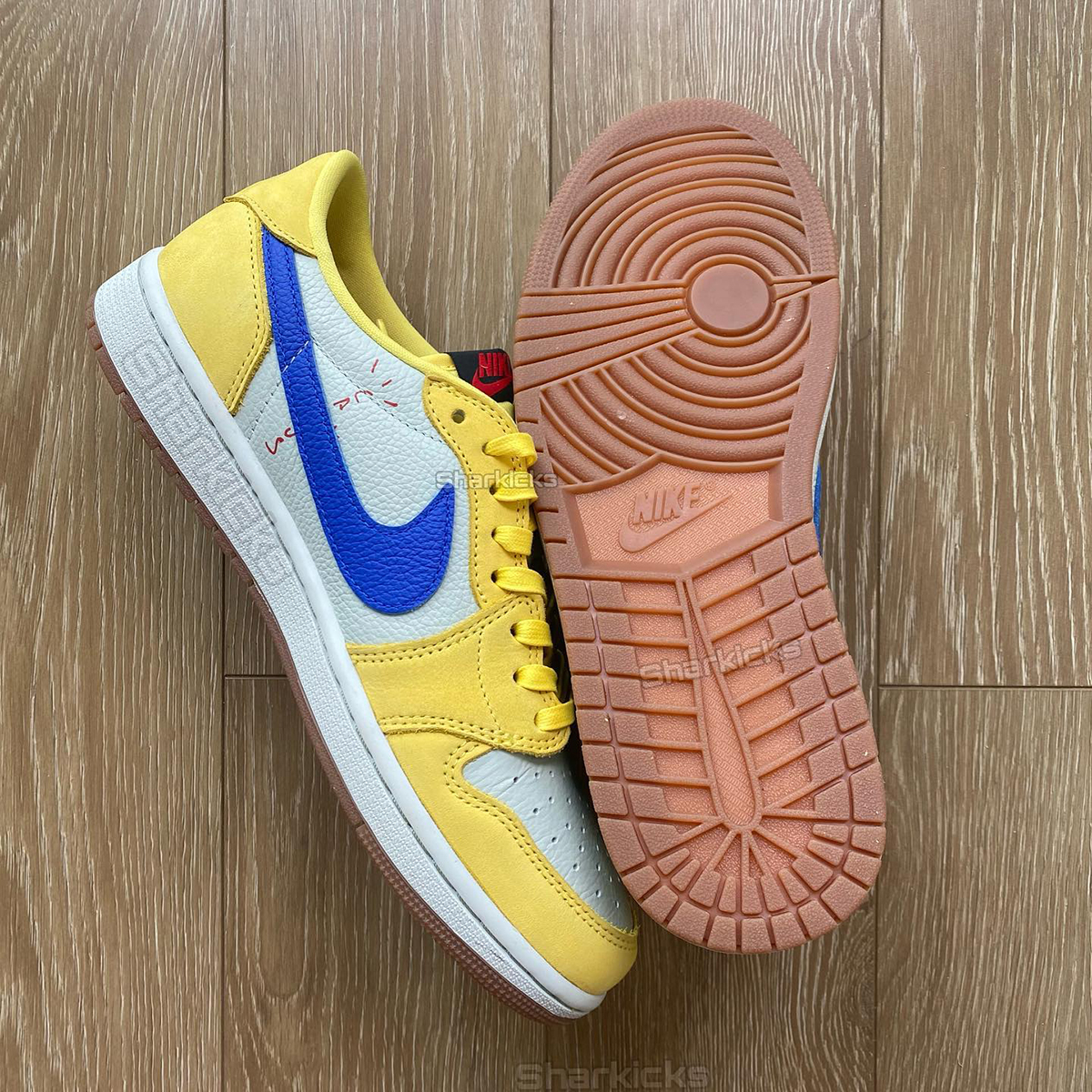 Travis Scott Jordan 1 Low Canary 7