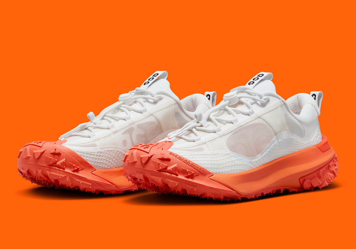 The Nike ACG Mountain Fly Low 2 Boasts Split White/Orange Coloring