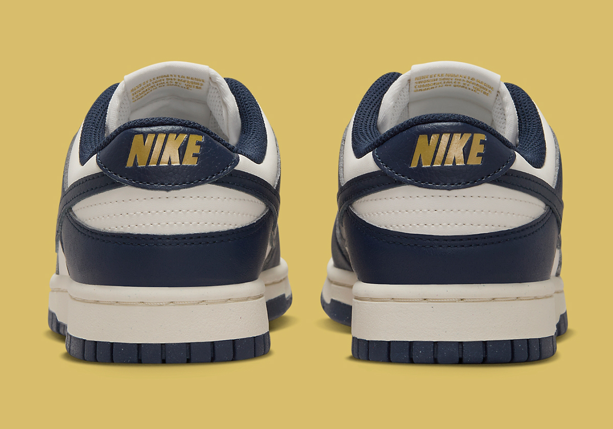 Nike Adds Vintage Touches To The Dunk Low With Golden Accents