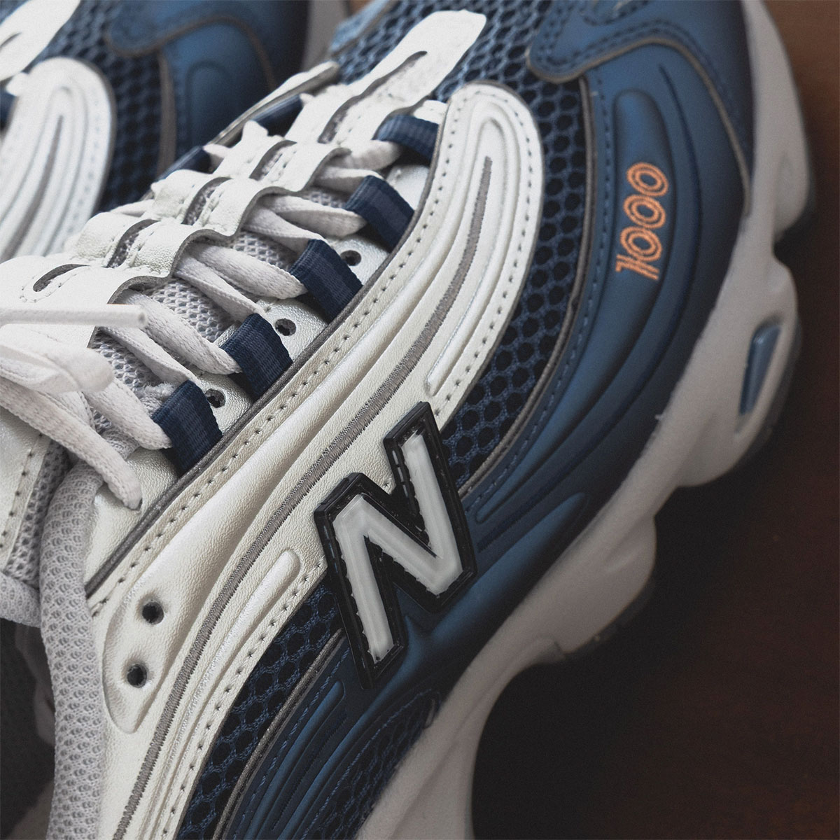 New Balance 1000 Vintage Indigo Light Silver Metallic Peach Nectar M1000p 1